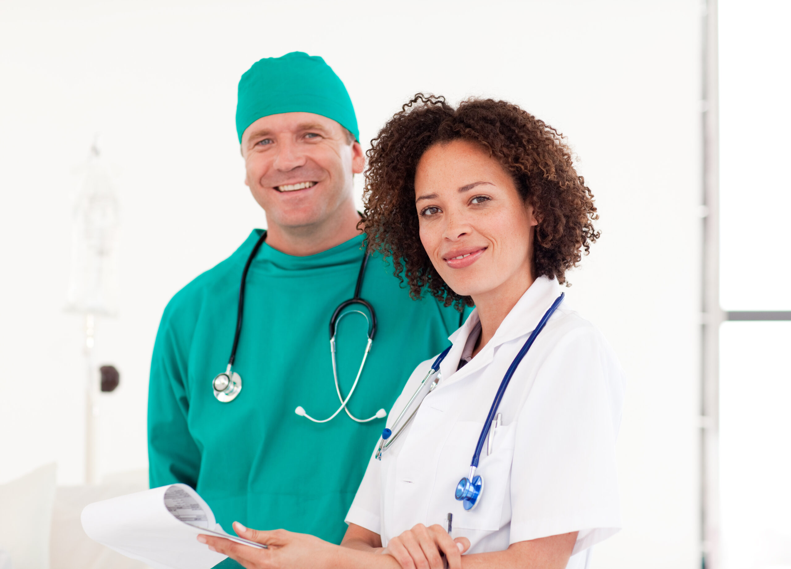 Portrait of doctor and surgeon in a hospital together